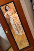 I am a firm believer in reading reviews but never writing them, but this dress deserves its flowers (both figuratively and literally). I had initially tried the medium, which wouldn't zip up over my chest, but the large fits like a glove. Waist snatched. Feel like I'll be the belle of the ball. love. - Tamara B.