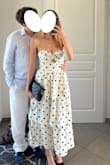 The dress fits perfectly. You can tie it the way you want, so it fits the body very well, even though I remember it was quite tight on each side when you have to zip it. I wore the dress with 6cm heels since it was a bit long for me (I am 5'3/163cm). The quality is quite good, it's pretty light, perfect for the summer. I wore it to celebrate my birthday at the restaurant, and it was perfectly appropriate for that kind of event. I am very happy I purchased it, and I can't wait to wear it again. - Clemence R.