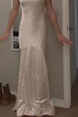 This is more of a dark ivory or cream color. - Allyssa S.