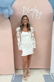 I wore this dress for my bridal shower and it was perfect all around! It fit so well!  I normally wear a small/medium and I went with the medium because it is a shorter dress. It fit perfectly. I got so many compliments on the dress! - Brianna F.