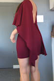 This dress was the potential to be a WOW! But it was pretty short on me and and front was just too much for my body. I think this dress would be better on someone who is not very petite...it's a lot on top. - Tiffany G.