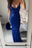 Very flattering and fits perfectly. I ordered xs, and I was going to get xxs, but the xs is perfect. It's a little long, but I'm short, so I figured. Material is nice too! - Lily O.