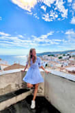 This dress is perfect. It can be dressed up or down. I brought it on my first solo trip to Europe and couldn't have purchased a more perfect dress for the occasion. I usually purchase a size S dress because I like them to fit tight, but I purchased a M in this dress since the fabric does not stretch. That was the right call for me; it's definitely true to size. It's also worth noting that the dress is bra-friendly and super comfortable. - Keara P.