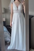 I really wanted to love this dress because the bottom is really flowy and flattering, and has a really soft lining. But the top is... crazy. If the entire bodice was solid white fabric, it would be a game changer. Unfortunately, it is sheer right above and below the bust, but there are two white cups that draw awkward attention to your boobs. I'm smaller chested, and yet the cups were still sewn way too high up. Like 1.5 inches of my breasts showed under the cup where the sheer fabric is.
It's also somehow too small and too large. The straps are too long yet the bodice is quite form fitting. To make it wearable, I'd need to spend twice as much money on alterations than I paid for the dress itself. So much potential but unfortunately a bust! - Kelly J.