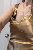 The fabric is thick, unforgiving and not flattering. It stands awkwardly on the chest area. I will never wear this dress and unfortunately I bought it on sale. What a waste of money. - Tamar I.