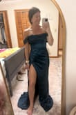 I ended up wearing a different dress to the event that I attended, but I would have loved this dress. It had a tighter fit, but I would not change the size that I ordered. I would have been uncomfortable in this dress all night, but overall it fit well and was very beautiful. - Kyleigh W.