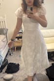 The dress fits as expected! It is not see through at all and is so pretty! The pattern is high quality and beautiful. - Anna F.