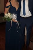 This dress was very long on me even with 4.5 heels. The slit in the side fell too low on my leg but with hemming it was fine. - Cailin C.