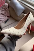 These shoes were everything I wanted and more. Absolutely stunning and such nice quality. The only downfall is that they are half a size too big. I am a standard 7.5 in almost all shoes, but they were too big to make do. I exchanged for a 7, hoping they fit!!! - Ava R.