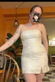 Fits pretty tight, but if I sized up, then it would have been too big, I think. The boning gives nice support. Labeled as ivory, but it is much more yellow/butter in person than it looks in the pictures. I wanted true white for graduation, so I'm returning. - Rachel M.