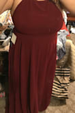 I was a little hesitant on ordering the dress because at the store I was a size 16 dress and the size of chest is always a deal breaker with dresses. Also the sizing chart said XL fit 12-14, but the dress fit I'm assuming since it's pretty uncovered from the back that it helped. But I really like the dress. - Elena M.