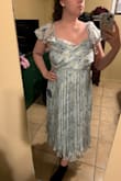 The back is really pretty, and the lace up back helps it fit better. The bust area is just designed a little weirdly. - Pamela J.
