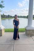 I bought this for my daughter's school dance, and she looked so cute in it. It fit her perfectly, but she had to get it altered since she's petite (5 feet). - Alicia K.
