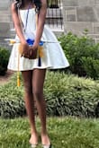 The dress was true to size, and my daughter received many compliments. I love the fit and white works perfectly for an 8th-grade graduation. - Emetem N.