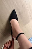 The straps are way too long, but since I bought this on sale and it fit otherwise, I ended up cutting the straps shorter and remade a new hole so it fit around my ankles. - Kat C.