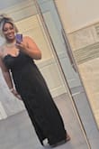 I was unsure what size to get, but I trusted the sizing chart. The dress arrived and was a little too loose on the sides and a bit by my bust. I had to get it taken in a bit. After that, it fit great and made me feel really pretty. I'm also tall, 5'10, the length was perfect even with 4-inch heels. I wouldn't size down. I would just get it altered. - Cristen D.