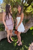 Flowy and cute with a fun lace-up back! Perfect fit and length for tall girlies. - Kara B.