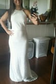 This is a gorgeous dress. I was highly considering it as my wedding dress but decided to choose a different Lulu's dress. I love the classy high neck and sexy low back. The quality is great! I was shocked since it is so inexpensive. - Samantha W.