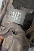 I received this dress with a rip on the side seam. Dress is new and hasn't been worn yet, and is already falling apart - Sravya K.