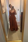 I bought this dress for a Wedding in June. It was on sale, only one size left (small), and even though I was nervous about the chest area, I said why not. Well, I'm a 34C and really need the support& For the first time ever I don't need to wear a bra!! It's crazy how great it fits. It is long, but I'm pretty petite, so I would be surprised if it wasn't. Incredible gamble that paid off! - Lucia G.