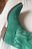 These are not the same color as the picture?? The reason I bought them was for the beautiful pale green. It honestly looks like the top of the foot was a different patch of material bc it's a different color than the rest. - Natalie L.