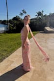 Got so many compliments! It was a little long for me (which is expected because I am short) but I did not get it hemmed and it was very manageable to wear. The built in scarf was such a nice touch and the color was so vibrant. It was perfect for a spring wedding. - Rebecca K.
