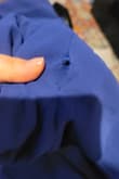 Went to try it on and noticed it had a rip on the chest already, I just opened it. - Lauren P.