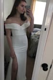 I ordered this dress for prom and was worried it would be to big in the top as I'm very small chested, but the small fit me perfectly and I am absolutely in love with this dress! It's beautiful, a good length, holds up well, and slit adds just enough sexy to the elegant look of the dress! - Abby C.