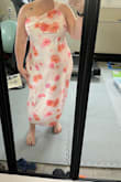 This dress, I thought, was more white than pink. It is a soft pink under the floral. The fit overall was big. The adjustable straps helped make it fit better but still didn't do much for my shape. Pretty overall, but not for me. - Morgan G.