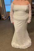 I absolutely adore 95% of this dress. I'm having a destination wedding on the beach. Just a small private ceremony. I didn't want a huge wedding dress. I love everything on this dress except the drop waist. It felt out of place and odd. I am keeping this dress and getting that altered out! Just know if you get it, it isn't the most flattering on curvier bodies. I attached a picture as is and how it is going to be with the alterations. It's a bit on the long side but otherwise the fit was perfect! - Kapri C.