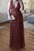 I loved this dress. The waist accent is very flattering. The dress is the perfect length for heels or flats for my height. The color is great and shimmery in person, looked great in the sun. Only thing I did not like was how large the top was even tightened to the fullest it was loose. I ended up sowing it to my preferred length. Overall, a great dress! - Lilly G.