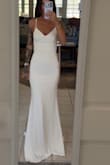 I tried on 8 Lulus dresses and this was immediately the one. The fit is so flattering and classic. I absolutely love it. It is a little too long, I am 5'5 100 pounds, the only alteration needed is for the length and I'll replace the straps. - Mariah M.