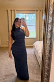 Such a beautiful dress. I ended up sizing down based on other reviews, and it fit like a glove. And I'm a true medium. My only complaint was on the left side, where the zipper is, the dress doesn't stay down. So I had to use body glue to hold it in place. Other than that, it was perfect. Received so many compliments all night. - Joanna J.
