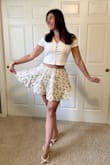 Great material, does wrinkle easily, though. It's lined so not see through! Overall, a cute summer skirt to throw on with a simple top. Can dress up or wear casual. - Taylor B.