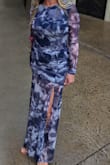I cropped the person out of the picture so it looks weird, but I love this dress. It fit great and I got lots of compliments. The slit is a little short so I did feel a little nervous at times, but overall I would recommend. - Jenny K.