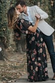I wore this dress for my engagement photos and it could not have been more perfect! The fit was so effortless and flowy and I received so many compliments on it as well. It is the perfect transition from summer to fall. - Laura M.