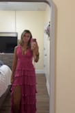I honestly love this dress! The back isn't my favorite, but it fits perfect overall. I did order an xs and it fit exactly how I expected! Not to mention the color is so gorgeous! - Ava T.