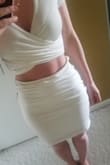 So I typically wear a medium from Lulus but I listened to previous reviewers and ordered a size up. I am glad I did. However, if I wear it highwaisted like the model, it is too large. So I have to pull it down to my hips,showing more than I had planned. So I cant wear it for what I purchased, but maybe another event. The white is not see through which is amazing! - Jacqueline B.