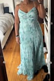 Beautiful dress. The pattern of the skirt and flowers are gorgeous and flowy and light. - Sarah W.