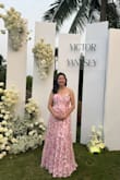 Highly recommend this dress. I ended up getting a M and wearing a bra corset underneath since I'm busty. Even with high heels on, the dress was slightly too long but I grabbed the front of it to lift up as I walked. Wore this for a humid wedding. - Jess F.