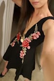 This dress looks spectacular! Very well-fitted and flattering at the bodice with modest flare in the skirt that hits mid-thigh. Perfect for any ladies who are smaller chested. The rose/ivy design is beautiful. - Vivien T.