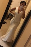 This dress is as pictured! A little snug around my waist line but its do-able. I will be wearing this dress my reception dress. I wanted something light weight. Since I'm so short it is a little long even with heels on but its similar to how sundress fit for me. A must buy! - Dawn B.