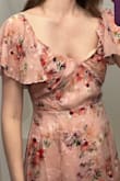 This dress was very pretty, I loved the color and fabric, unfortunately it was too low cut and loose in the front top. It showed my bra cup even when I tried to tighten the back as much as possible (see photo). - Katie W.