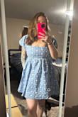 Love this dress, quality is great! I had to downsize due to the chest and sleeves being too big. The medium I exchanged fits perfectly! Great for a Bridal shower and not too short either! - Morgan B.