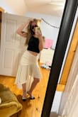 Get this skirt! It's so iconic and beautiful! You won't regret it! I bought it for a trip to NYC, and I can't wait to wear it there! - Holly M.
