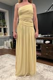 Was a little loose, and the cutout feels like it either needs to be larger or not there at all. The rouching was not falling right across the belly and looked a little baggy there, not sure if a steam would help, but it wasn't helping me feel my best as a potential bridesmaid dress. One positive is that at 5'7" I don't think I'd need a hem if I wore heels with a bit of a platform. - Melissa K.