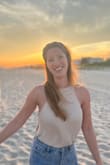 So cute and beachy! Have worn it loose or tucked in to jeans as well. Cute over a sticky bra or bathing suit! - Melissa K.