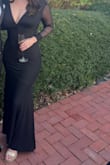 Wore this to a November wedding that was indoor/ outdoor on Long Island and it was perfect. Super comfortable material, feels good on the skin, material is bodycon around the waist and loosens from the thigh to the ground - Jackie F.