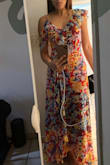Looks and drapes exactly as the picture. True to size. Vibrant colors, very eye catching. Good movement whilst walking, very comfortable. Worn all night and through a big dinner and felt comfortable. Much to my disbelief, I wasn't dying to get home and change out of my clothes by the end of the night. - Raquel D.