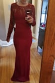 I purchased this to wear as a bridesmaid dress for a wedding in November. I ordered an XS. It's fitted throughout, however, the lace arms are a little loose. I may look into getting them tailored when I have the dress hemmed. - Carly S.